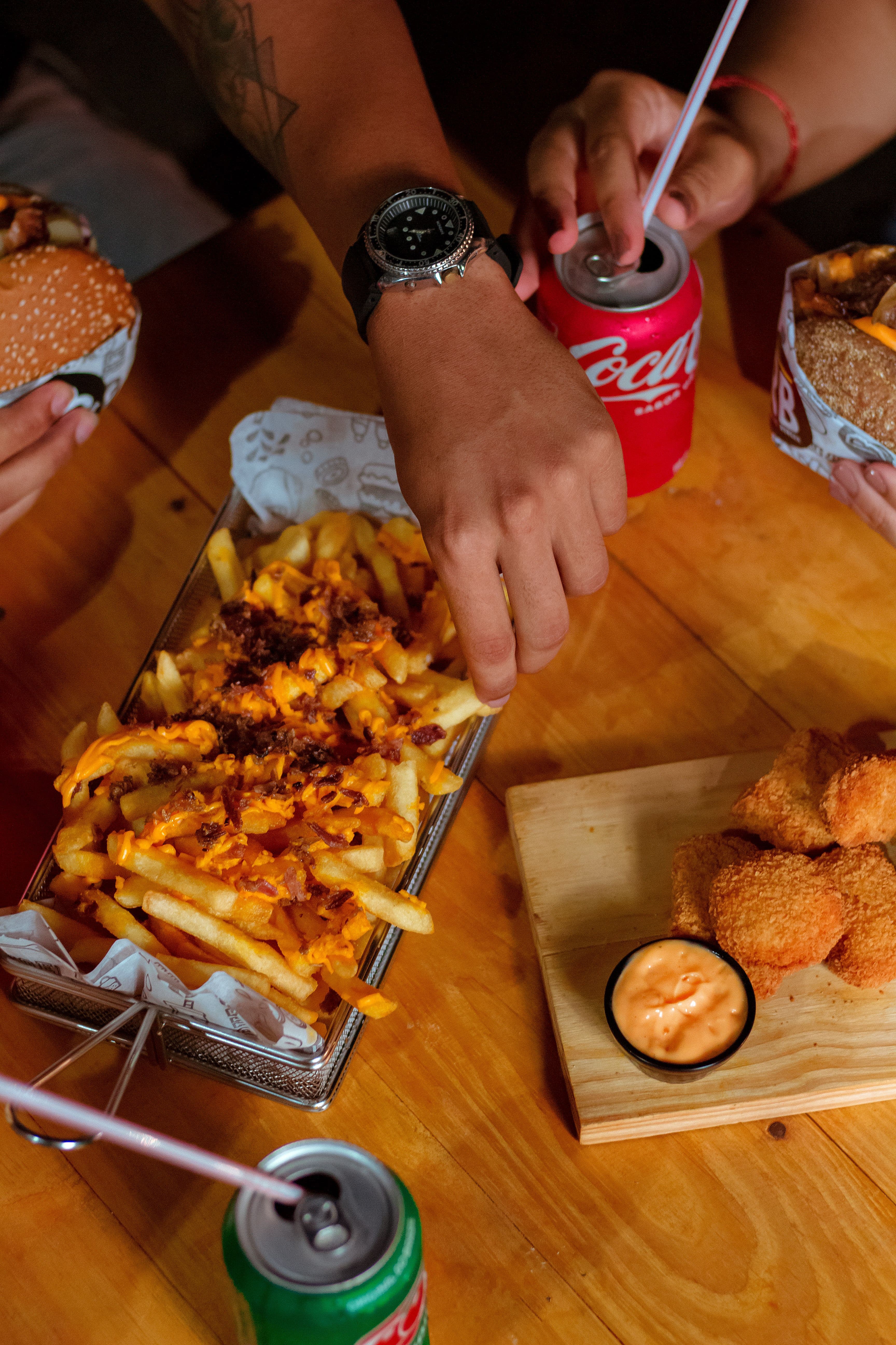 Customer photo: a burger and fries on a tray